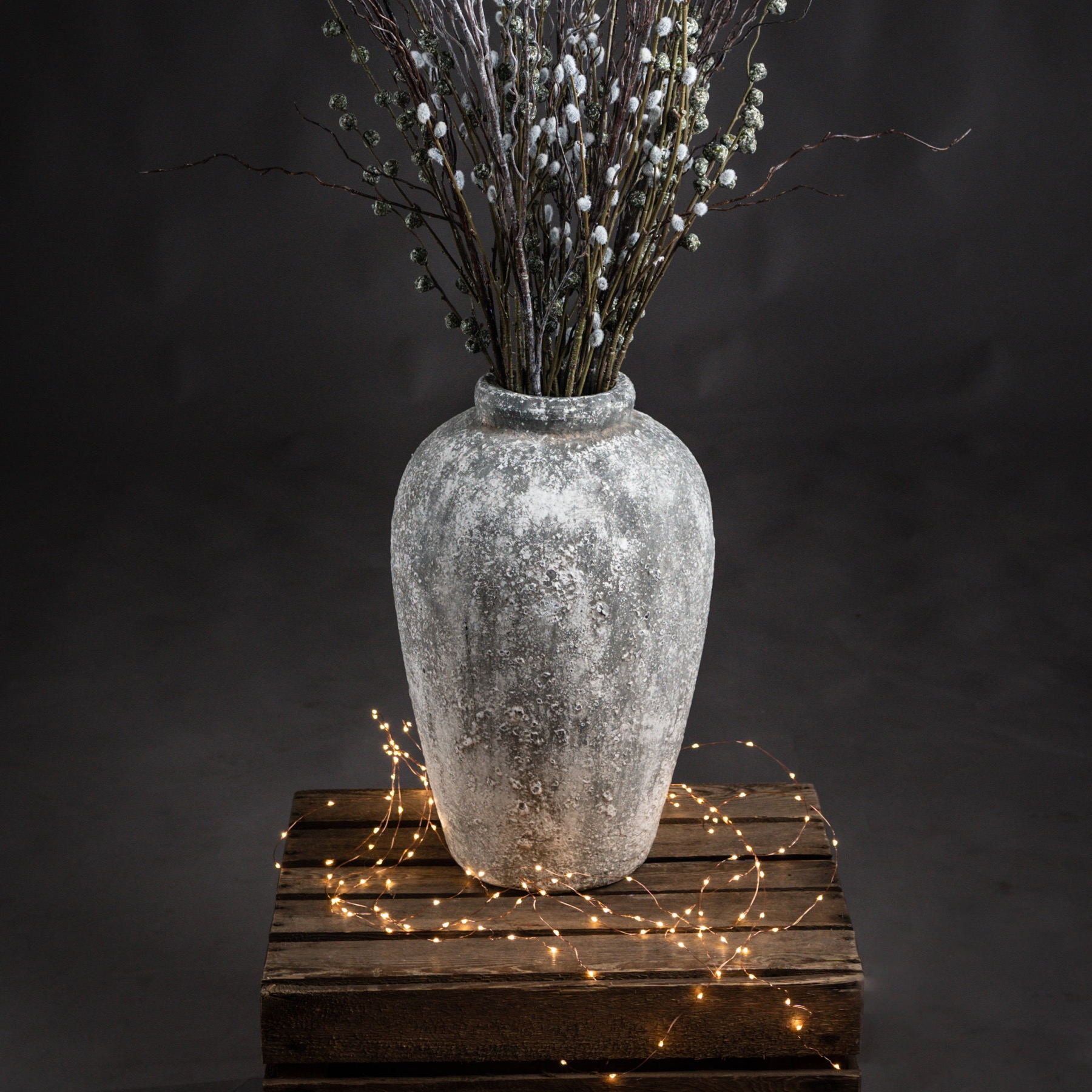 Aged Stone Ceramic Vase with Branches from the Youli collection by Xiamen Youli