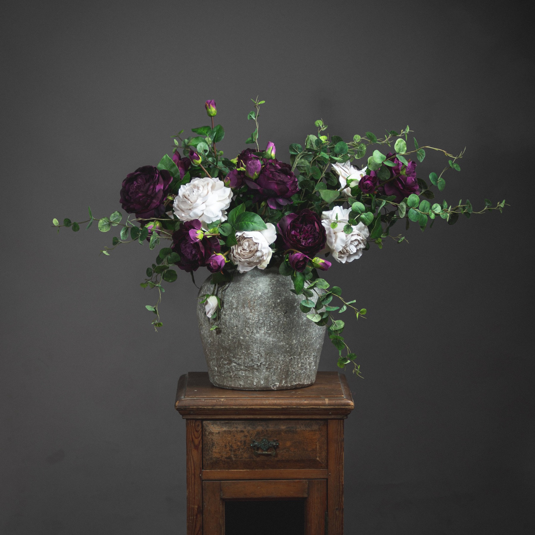 Aged Stone Ceramic Urn with Floral Arrangement from the Youli collection by Xiamen Youli